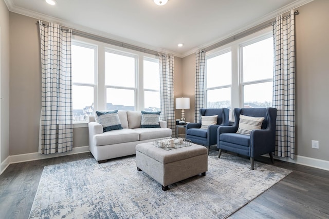 living room with crown molding and hardwood / wood-style flooring