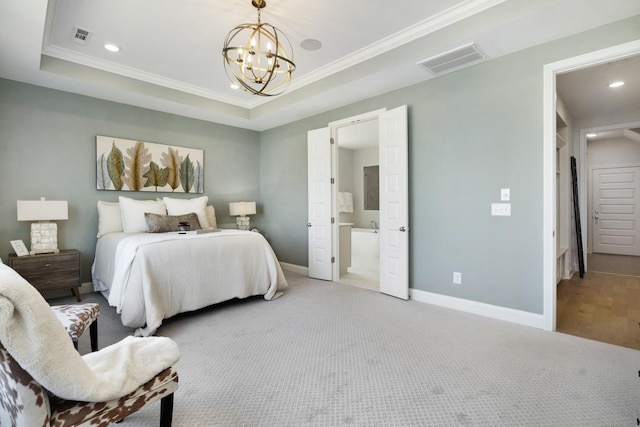 bedroom featuring visible vents, baseboards, a tray ceiling, and an inviting chandelier