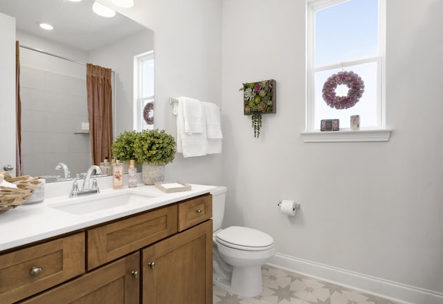 full bath with tile patterned floors, baseboards, toilet, and vanity