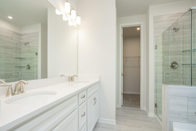 bathroom featuring vanity and walk in shower