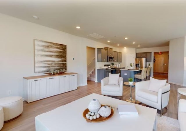 living room with light wood-type flooring