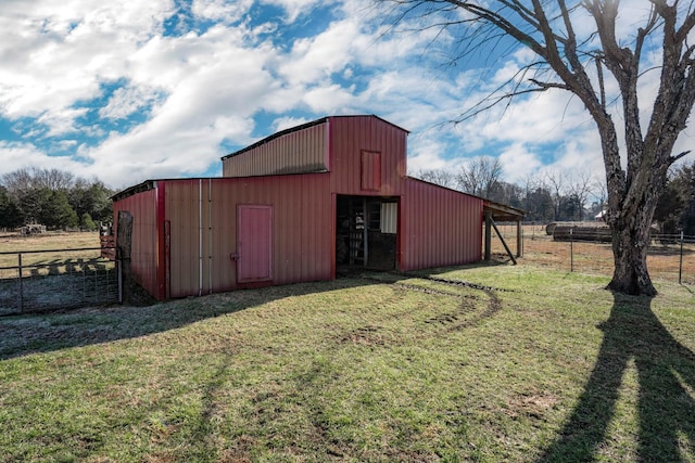 view of outdoor structure with a yard