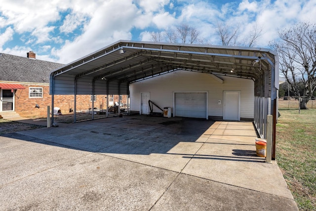 view of car parking with a garage and a carport