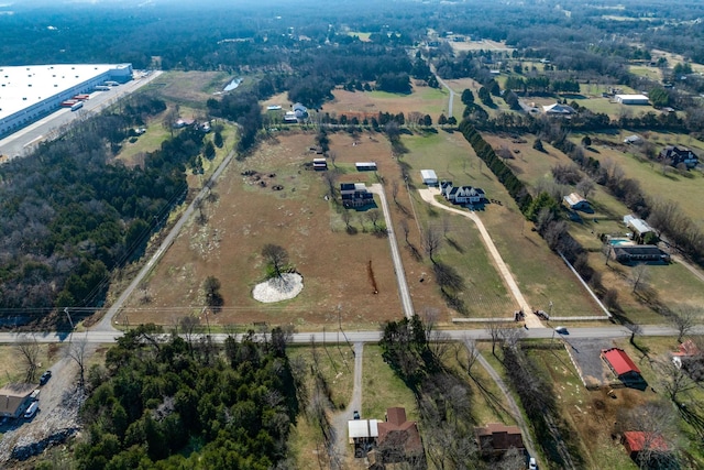 birds eye view of property featuring a rural view