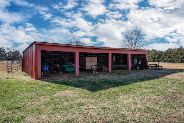 view of outdoor structure featuring a yard