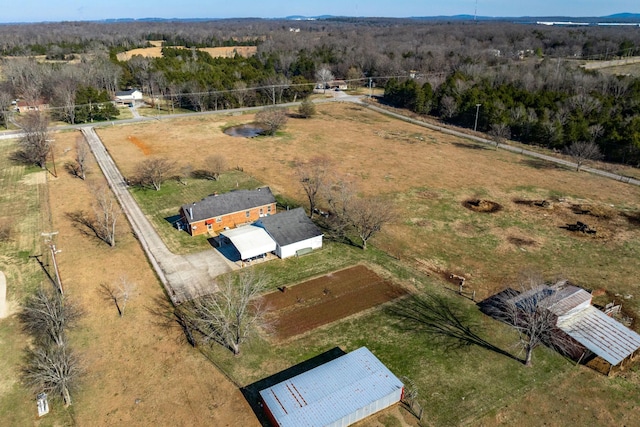 birds eye view of property featuring a rural view