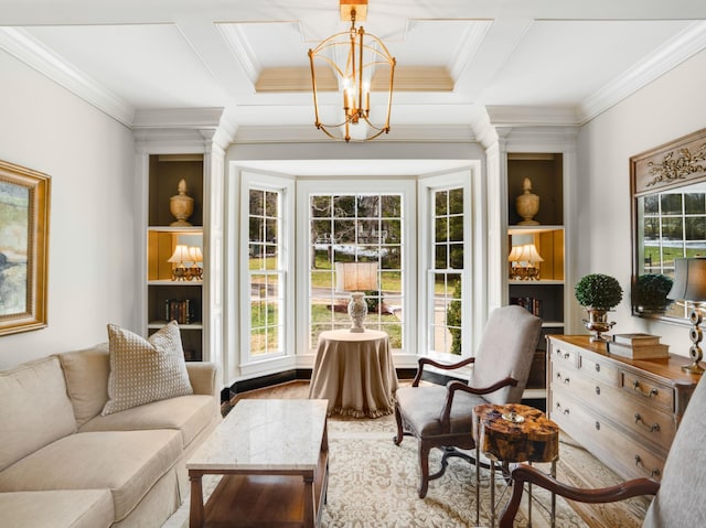 living area with a chandelier, ornamental molding, built in features, and coffered ceiling