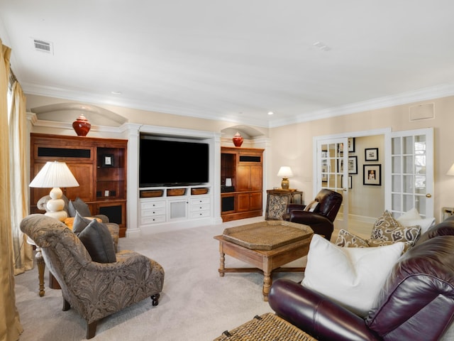 living room with light carpet, crown molding, and built in features