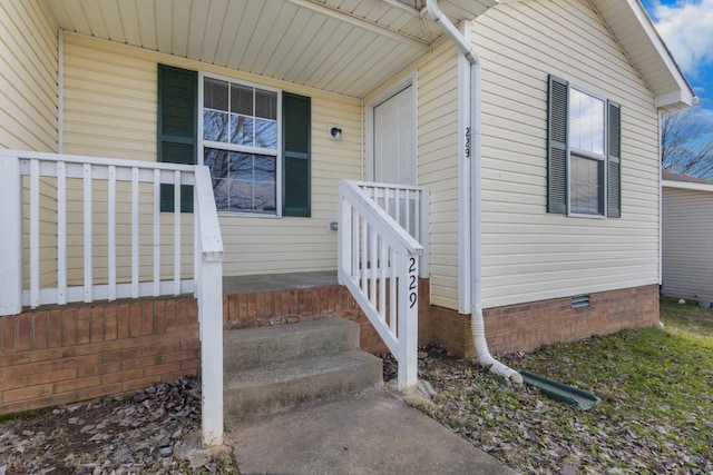 property entrance featuring a porch