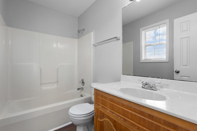 full bathroom with vanity,  shower combination, and toilet