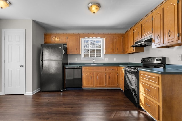 kitchen featuring sink, black appliances, and dark hardwood / wood-style floors