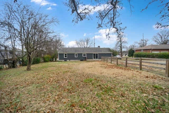 view of front of home featuring a front lawn