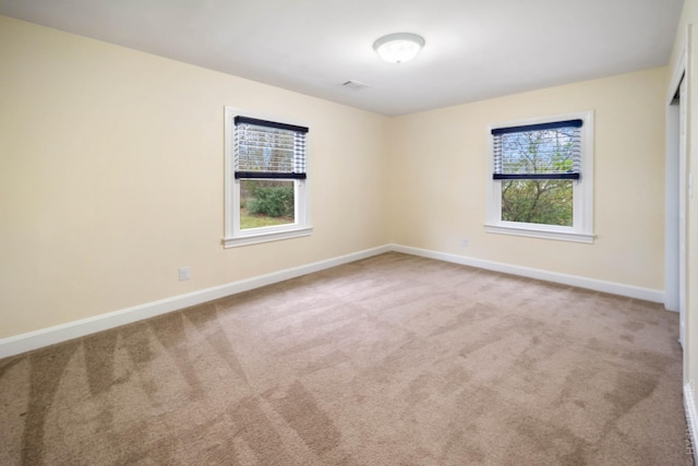 view of carpeted spare room