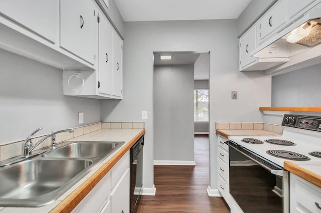 kitchen with sink, electric stove, black dishwasher, dark hardwood / wood-style floors, and white cabinetry