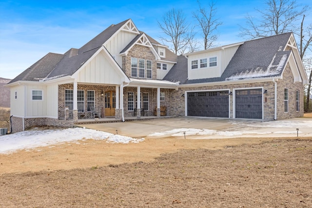 view of front of house featuring a garage and a porch