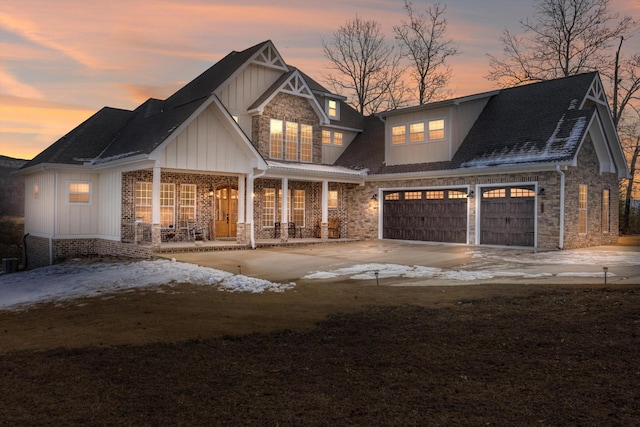 craftsman-style home with covered porch and a garage