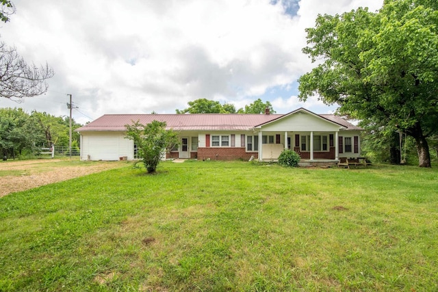 ranch-style home with a porch and a front lawn