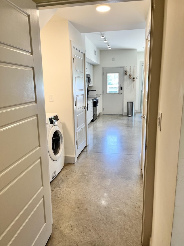 laundry area featuring washer / clothes dryer