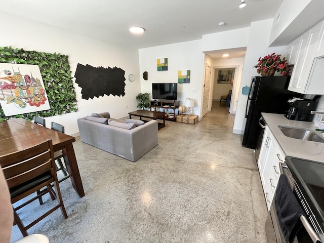 living room featuring sink