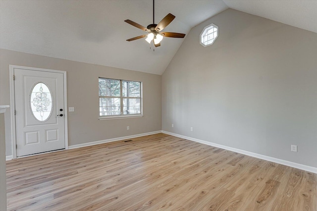 entryway featuring ceiling fan, plenty of natural light, and light wood-type flooring