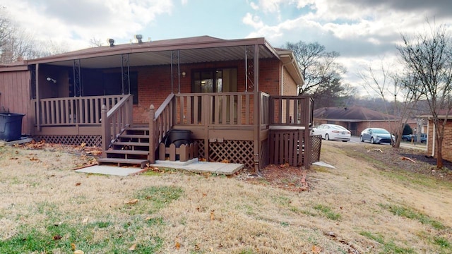 back of house with covered porch