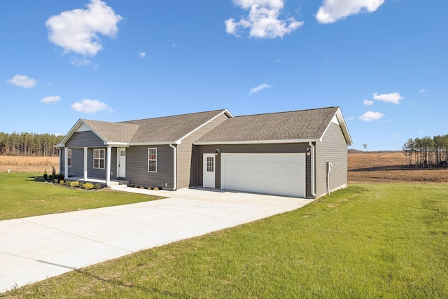 ranch-style house with a garage and a front lawn