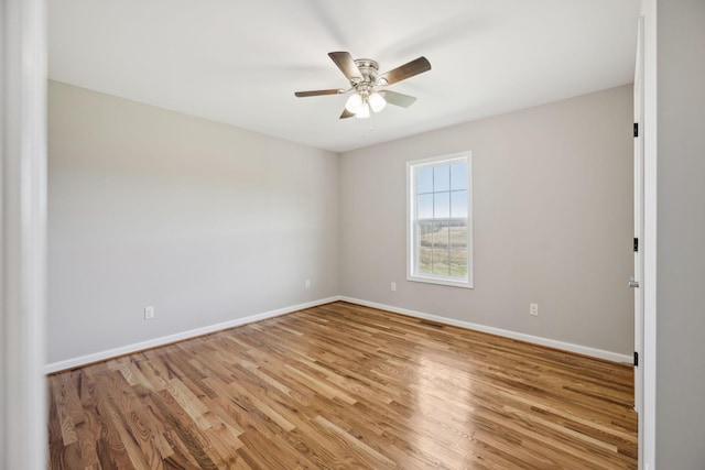 unfurnished room with ceiling fan and light hardwood / wood-style flooring