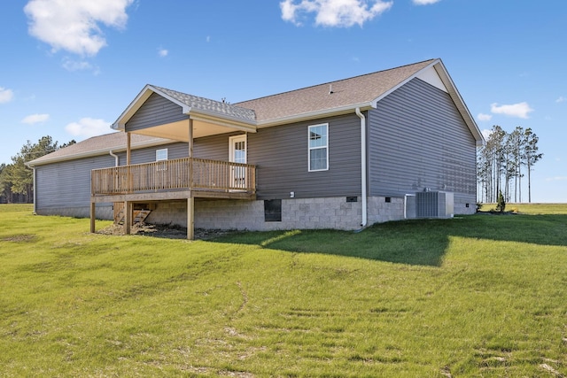 back of house featuring central AC unit, a yard, and a wooden deck