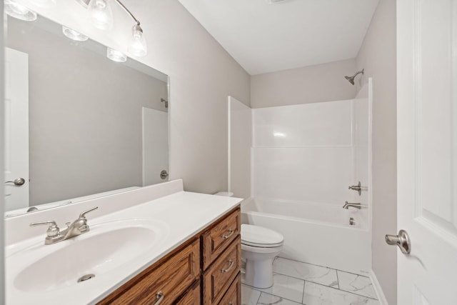 full bathroom featuring vanity, washtub / shower combination, and toilet