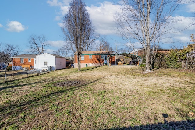 view of yard with a carport