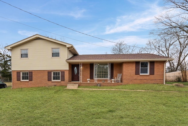 split level home with a front yard