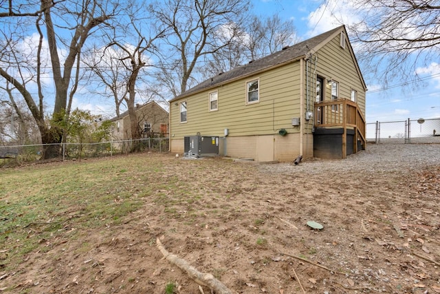 back of property featuring cooling unit