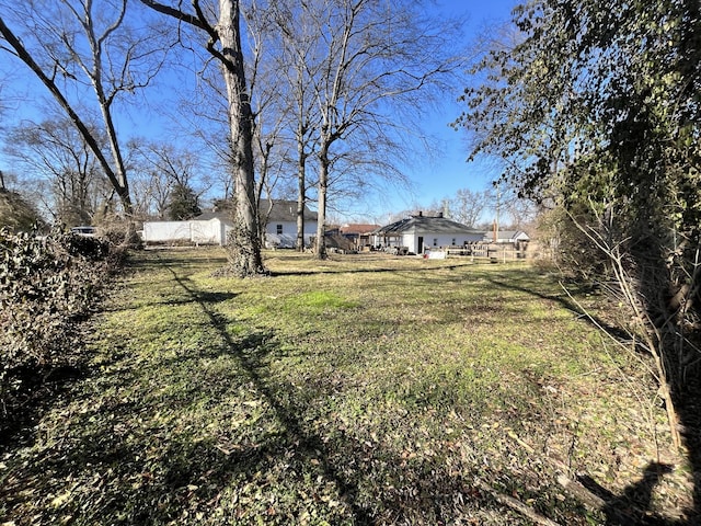 view of yard featuring fence