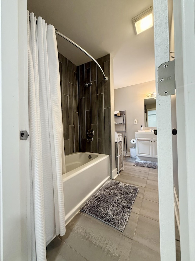 full bath featuring shower / tub combo, tile patterned flooring, and vanity