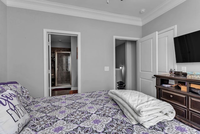 bedroom featuring connected bathroom and ornamental molding