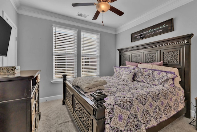 bedroom with ceiling fan, light colored carpet, and ornamental molding