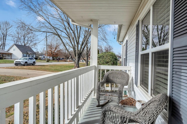 balcony featuring a porch