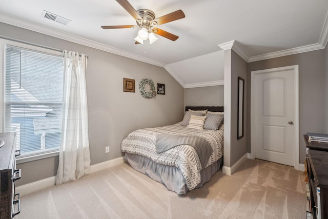 carpeted bedroom featuring ceiling fan, lofted ceiling, and crown molding