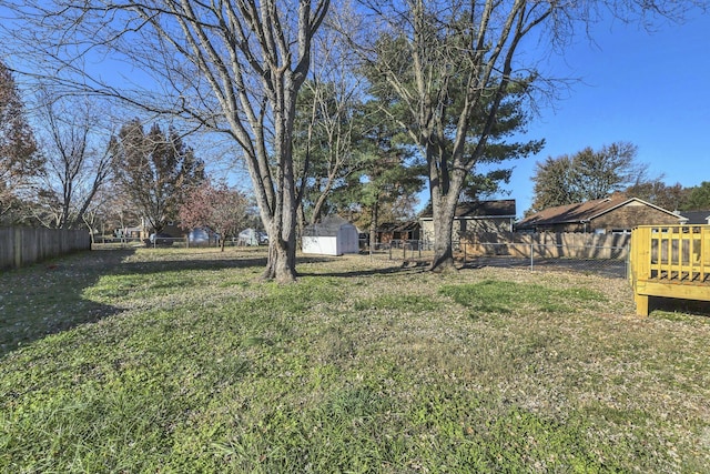 view of yard featuring a deck