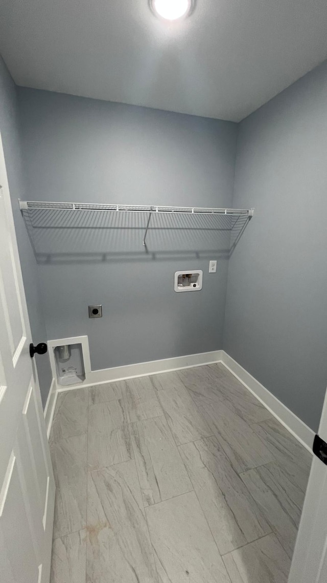 laundry area featuring electric dryer hookup and washer hookup