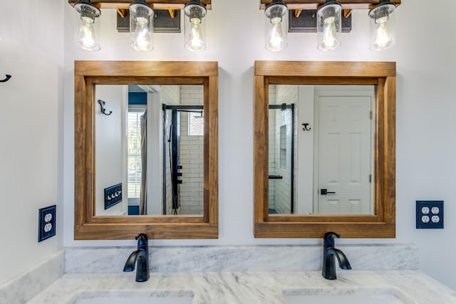 bathroom featuring vanity and a shower