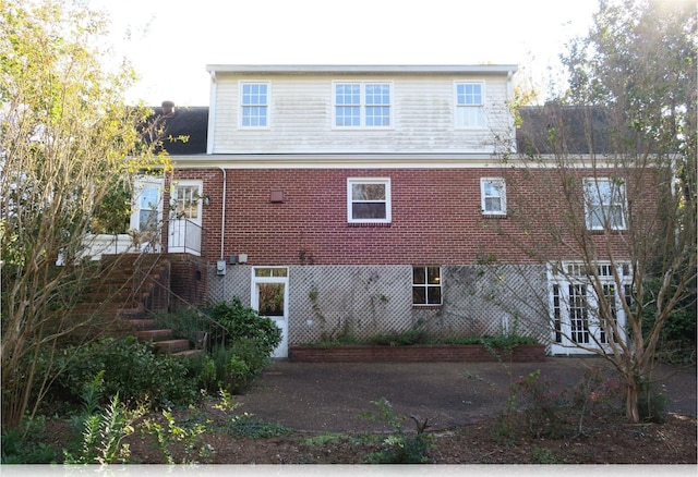 back of house with french doors