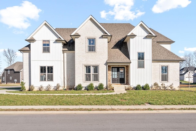 view of front of home with a front yard