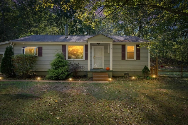 view of front of house with a front lawn