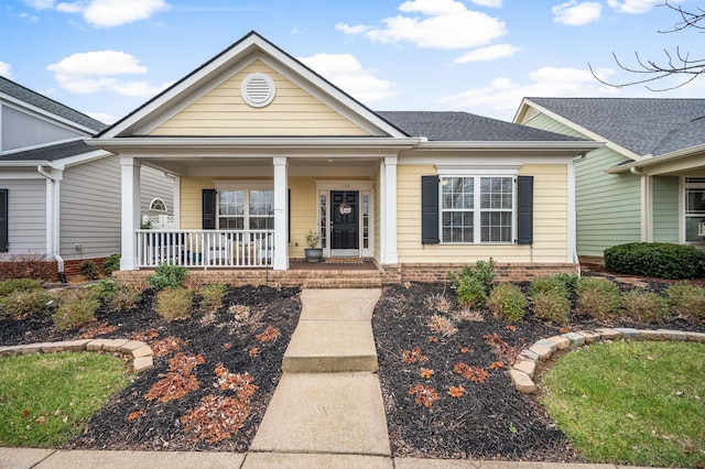 view of front of home featuring covered porch