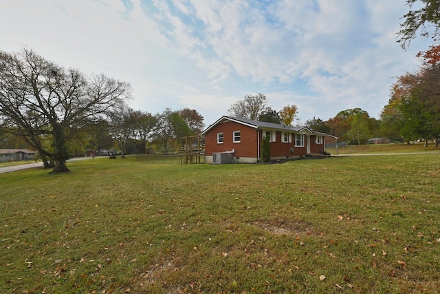 view of property exterior with a yard