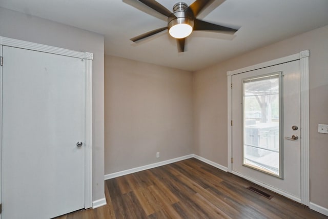 interior space featuring dark hardwood / wood-style floors and ceiling fan