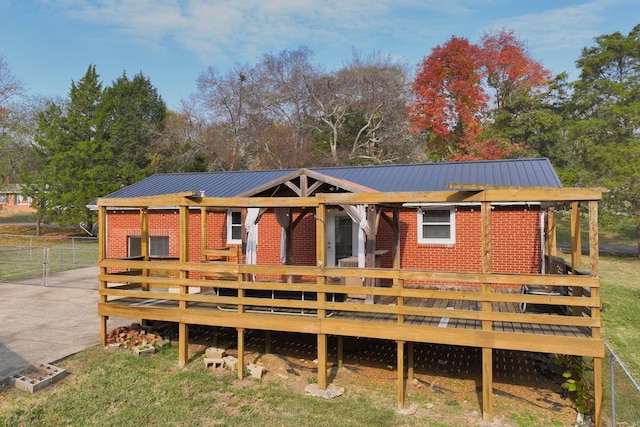 rear view of house with a deck