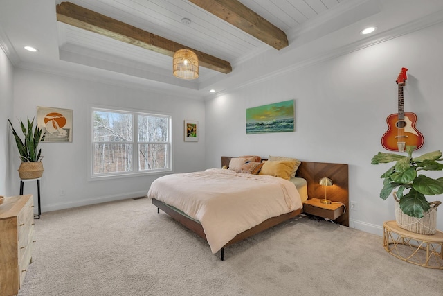 carpeted bedroom featuring beam ceiling, wood ceiling, and ornamental molding