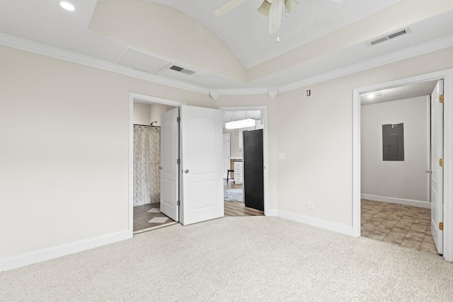 unfurnished bedroom with light carpet, black refrigerator, ceiling fan, connected bathroom, and electric panel